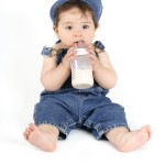 baby with a milk bottle